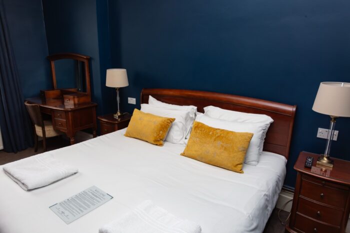 Comfy room with a superior bed at the white hart inn winchcombe